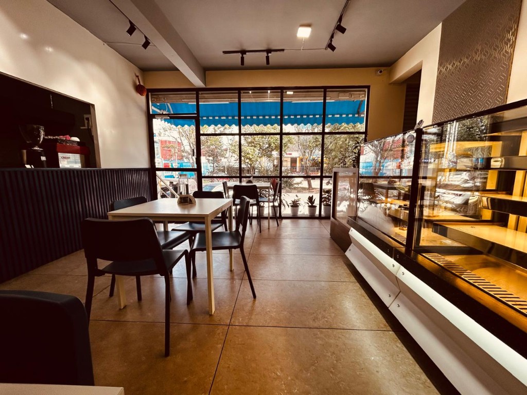 Ring Road cafe, with the pastry case and the street window